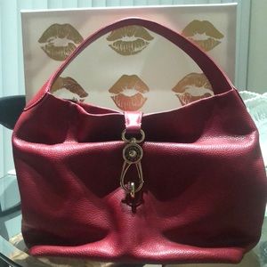 A HOLIDAY BAG DELIGHT- GRAB THY RED DOONEY TONIGHT